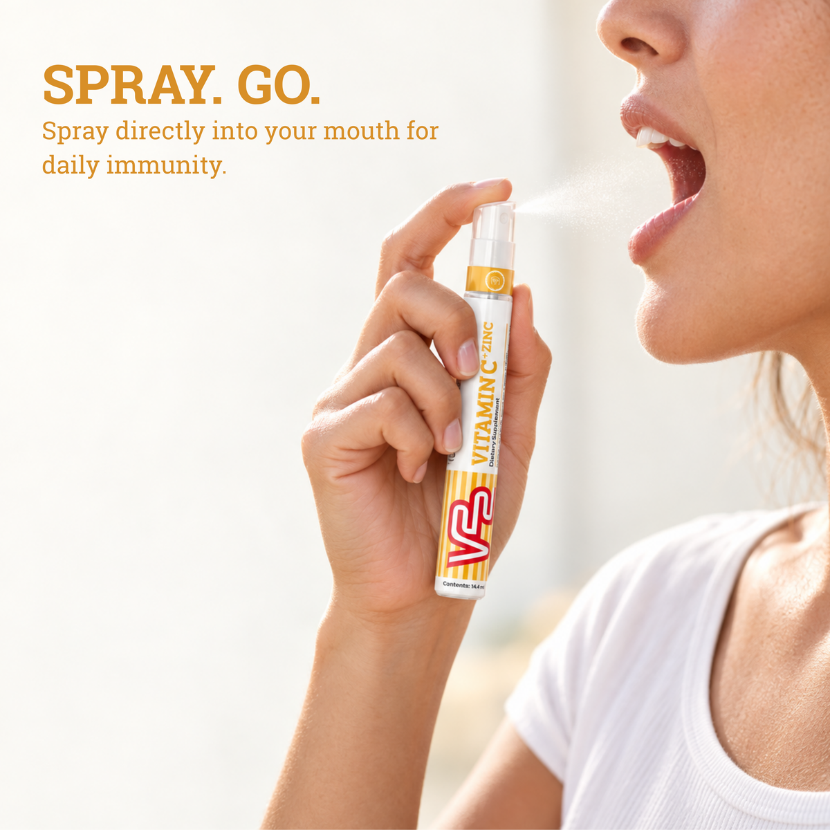 Person spraying V22 Vitamin C + Zinc directly into their mouth